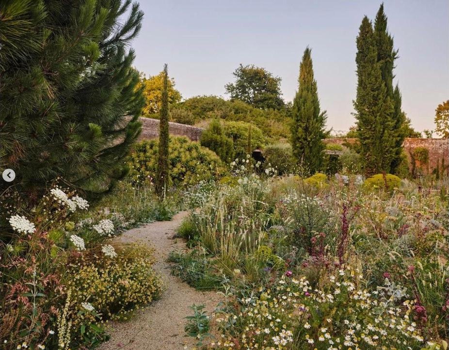 Gravel path through a walled garden